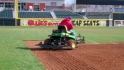 Grounds crew edges the grass